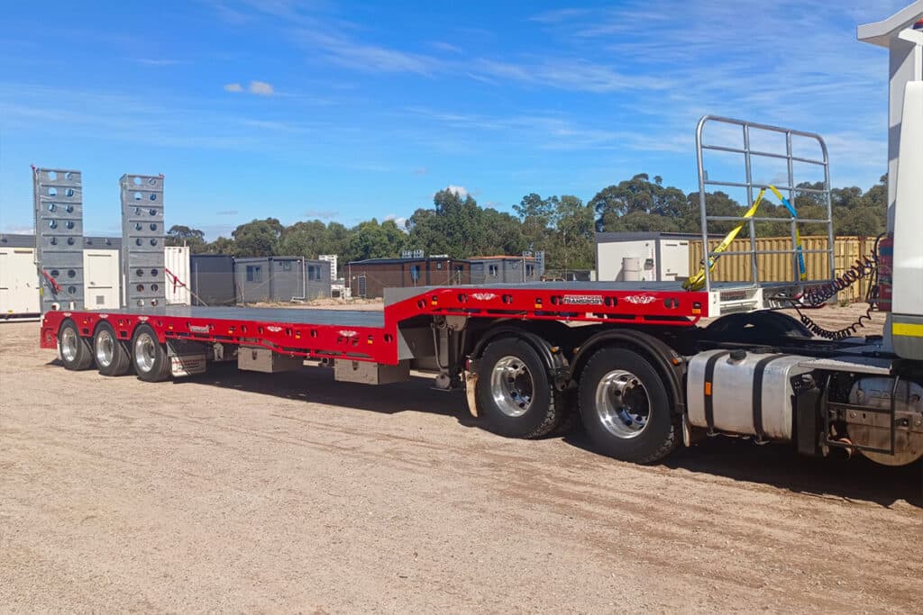 45ft Drop Deck Premium with Forward Folding Bi-Fold Ramps