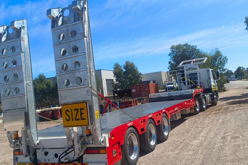 45ft Drop Deck Premium with Forward Folding Bi-Fold Ramps